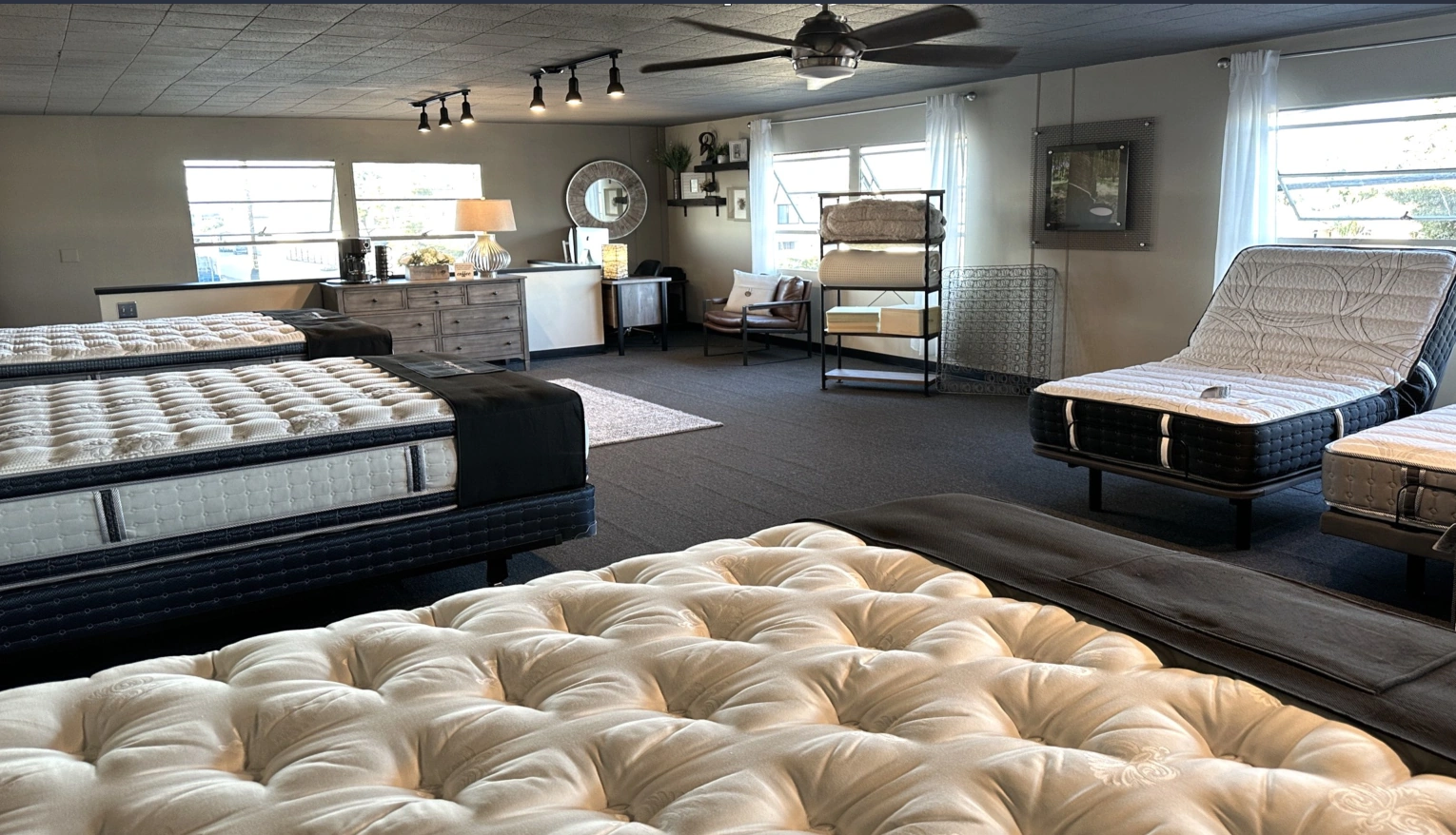 Handcrafted luxury mattresses on display in the Newport Mattress Factory showroom